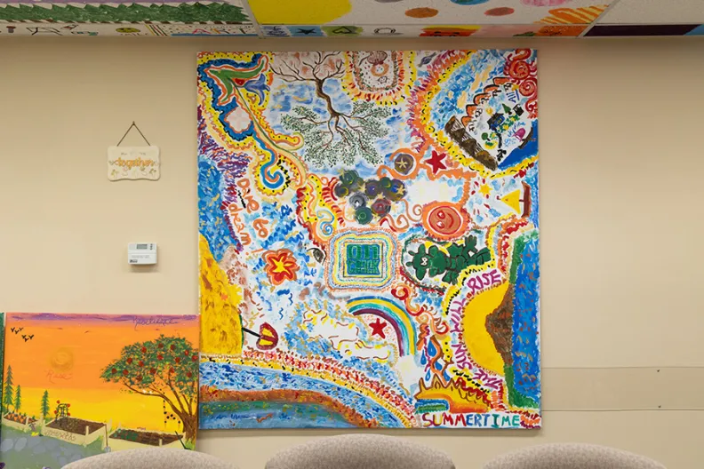Some of the colourful, therapeutic artwork created by clients in the OnTrack program.